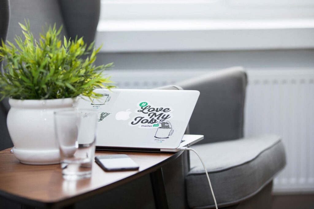 MailerLite Review: Affordable Email Marketing Without Compromise 9 Laptop on desk with Mailerlite logo